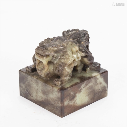 A CHINESE CARVED JADE BEAST SEAL