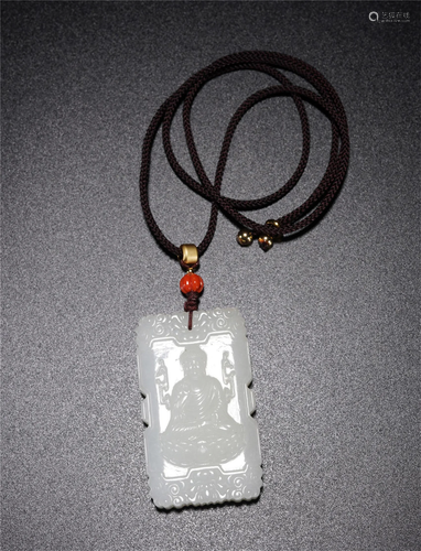 A CHINESE CARVED WHITE JADE PENDANT