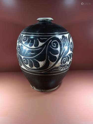 Carved flower and bird jar