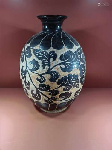 Carved ink glaze bottle