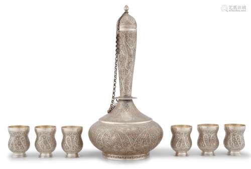 A KASHMIRI SILVER BOTTLE AND SIX MATCHING CUPS EARLY 20TH CE...