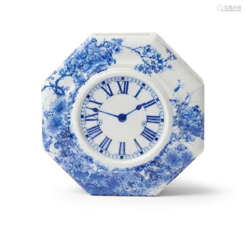 A RARE JAPANESE SETO BLUE AND WHITE CLOCK-FORM WALL VASE KAW...