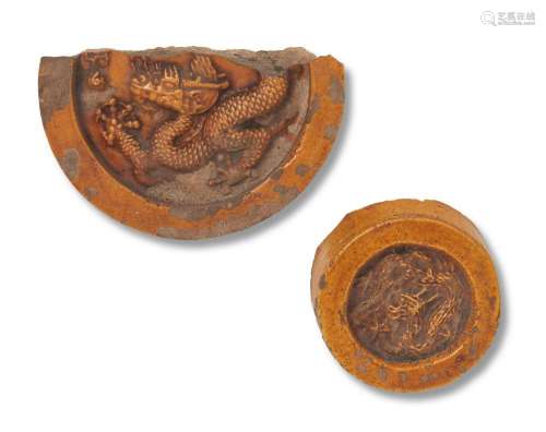 TWO CHINESE IMPERIAL YELLOW-GLAZED ROOF-TILE END-FRAGMENTS M...