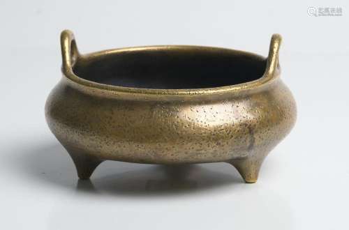 A CHINESE BOMBE-FORM BRONZE TRIPOD CENSER QING DYNASTY (1644...