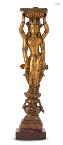 A TIBETAN GILT BRONZE DENSATIL-STYLE SUPPORT CIRCA 15TH CENT...