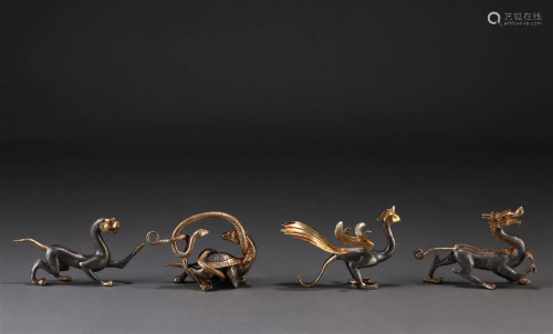 A Set of Four Chinese Bronze-gilt Mythical Beasts
