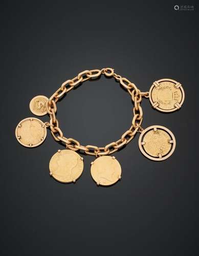 BRACELET "charm's" en or jaune (750‰) retenant six...