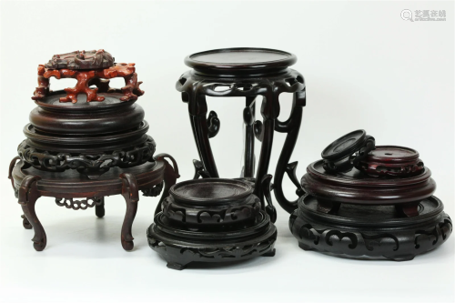 11 Chinese Hard Wood Stands; 1 Pressed Cup Stand