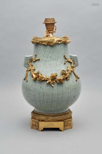 An ormolu-mounted guan-type vase, hu the porcelain of Qing d...