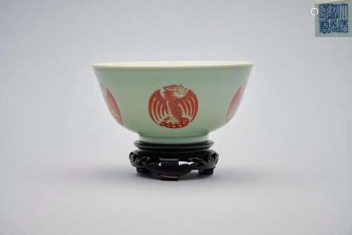 A celadon glazed and iron-red painted 'phoenix' bowl Daoguan...