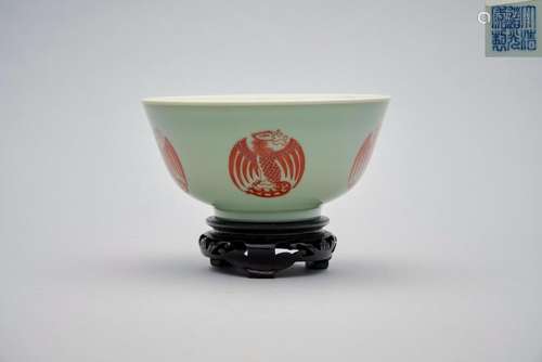 A celadon glazed and iron-red painted 'phoenix' bowl Daoguan...