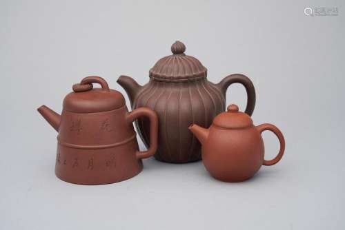 Three yixing teapots one with a stamped yixing zisha mark (3...