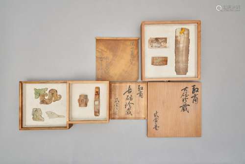 A suite of eight archaistic jade carvings (8)