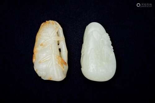 Two celadon jade 'bamboo' and 'pine' carvings (2)