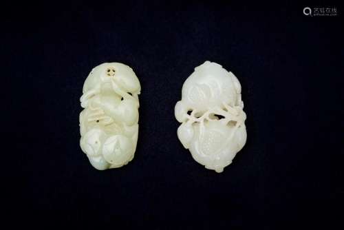 Two white jade 'pomegranate' and 'deer' carvings (2)