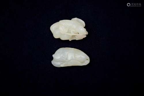 Two white and grey jade 'mandarin duck' and 'bean' carvings ...