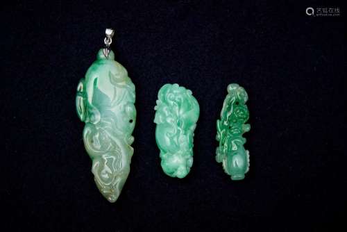 Three jadeite pendants (3)