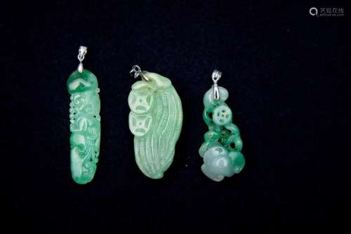 Three jadeite pendants (3)