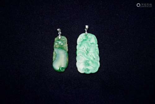 Two jadeite pendants (2)