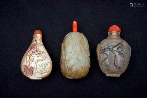Three jade, rock crystal, and mother of pearl snuff bottles ...