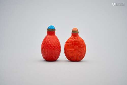 Two red glass snuff bottles one with Qianlong four-character...