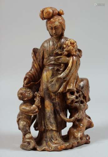 A CHINESE CARVED SOAPSTONE FIGURAL GROUP, beautifully carved...