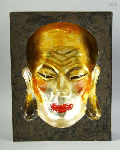 A CHINESE LACQUERED CONCAVE PICTURE OF A FACE, signed to rev...