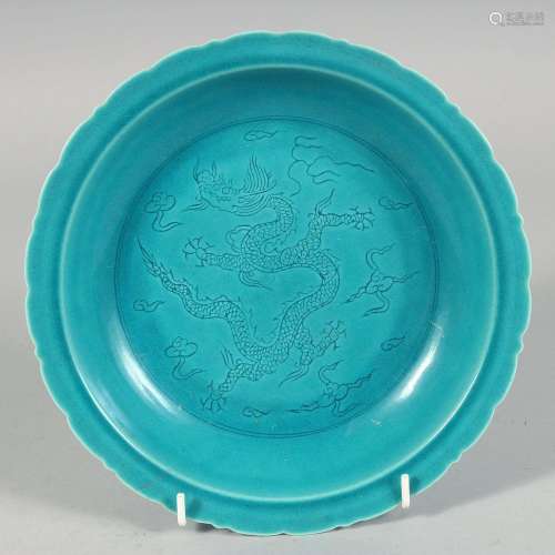A CHINESE TURQUOISE GLAZE PETAL FORM DISH, the centre decora...