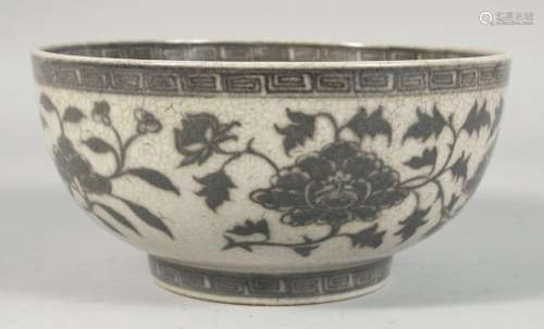 A CHINESE CRACKLE GLAZE PORCELAIN BOWL, decorated with large...
