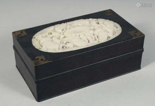 A CHINESE HARDWOOD LIDDED BOX with carved jade inset to lid,...