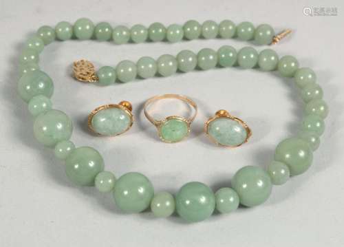 A 14CT GOLD AND JADE RING AND EARRINGS, together with a grad...