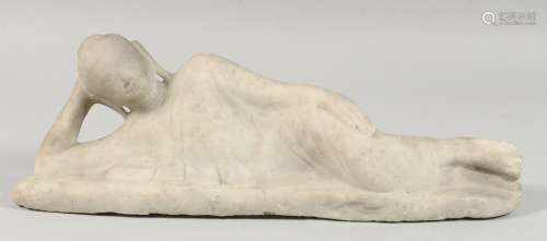 A TIBETAN CARVED MARBLE BUDDHISTIC FIGURE, 48cm long.