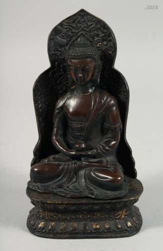 A BRONZE FIGURE OF SEATED BUDDHA, rested on a detachable bas...