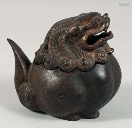 A CHINESE BRONZE BULBOUS LION DOG LIDDED CENSER, with traces...