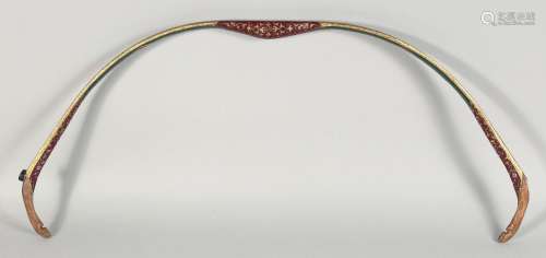 A TURKISH OTTOMAN WOODEN BOW, painted with foliate decoratio...