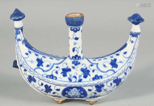 A TURKISH ISNIK GLAZED POTTERY WATER FLASK painted with foli...