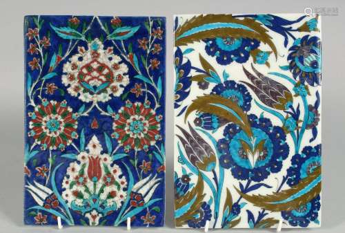 TWO TURKISH IZNIK GLAZED POTTERY TILES, each decorated with ...