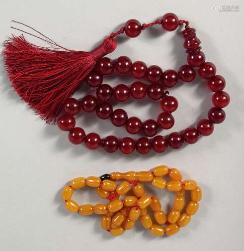 TWO SETS OF ISLAMIC BAKELITE PRAYER BEADS.