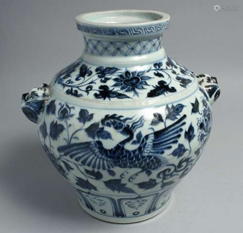 A CHINESE BLUE AND WHITE PORCELAIN TWIN HANDLE VASE, the bod...