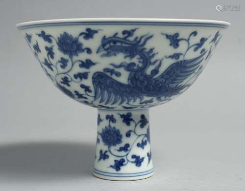 A CHINESE BLUE AND WHITE PORCELAIN STEM CUP, the exterior pa...