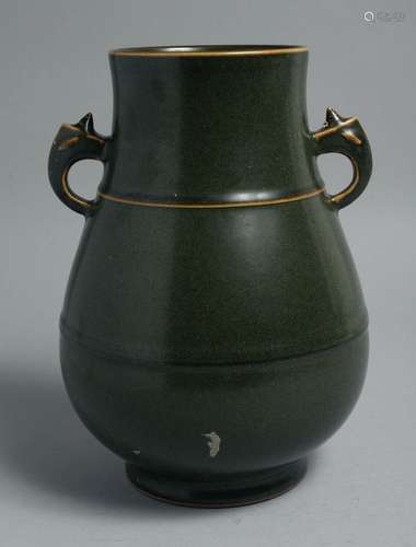 A CHINESE TEA DUST GLAZE TWIN HANDLE VASE, the base with imp...