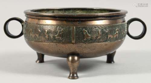 A CHINESE ARCHAIC BRONZE TRIPOD CENSER, with twin handles, t...