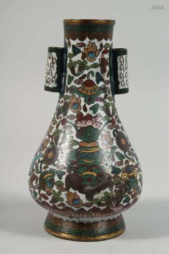 A CHINESE CLOISONNE TWIN HANDLE ARROW VASE, decorated precio...