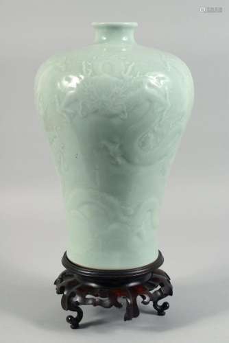 A LARGE CHINESE CELADON GLAZE MEIPING VASE with hardwood sta...