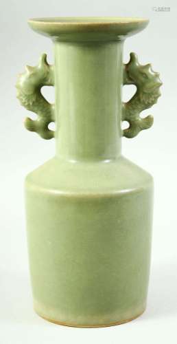 A CHINESE LONGQUAN STYLE CELADON TWIN HANDLE VASE, the handl...