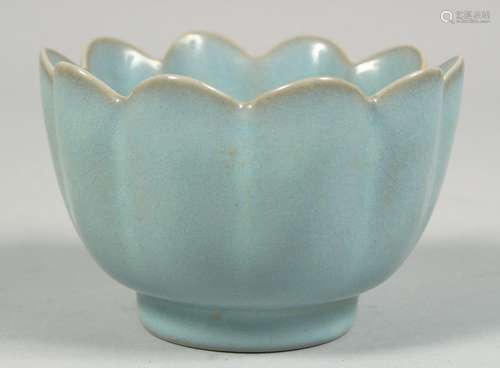 A SMALL CHINESE CELADON PETAL-SHAPED BOWL, 10.5cm diameter