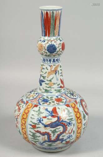 A CHINESE WUCAI PORCELAIN VASE decorated with panels of drag...