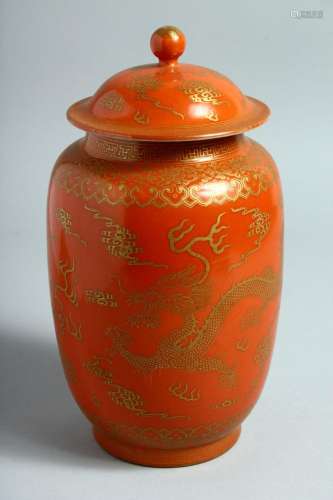 A CHINESE CORAL RED GLAZE PORCELAIN JAR AND COVER, with gilt...