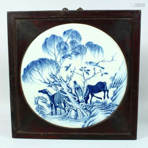 A LARGE CHINESE BLUE AND WHITE PORCELAIN PANEL, inset within...