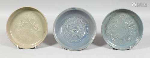 A GROUP OF THREE CHINESE GLAZED POTTERY DISHES, two with blu...